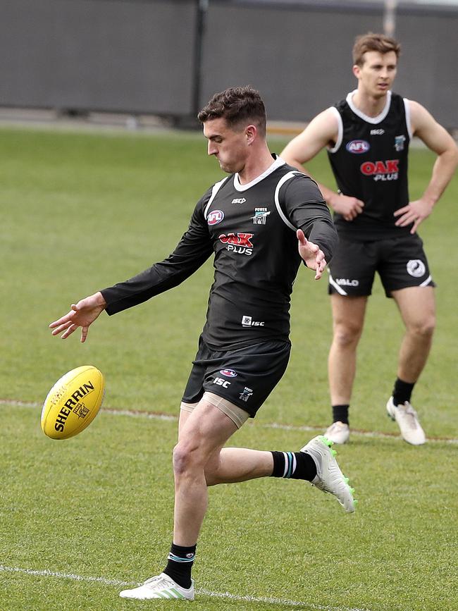 Port Adelaide’s Tom Rockliff trains at Adelaide Oval. Picture: Sarah Reed