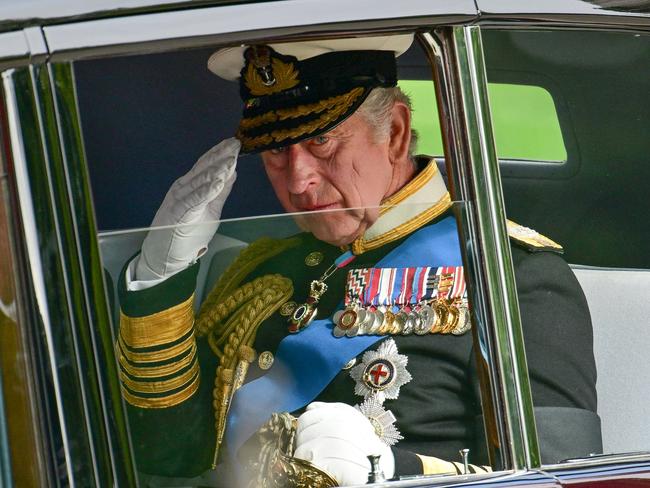 LONDON, ENGLAND - SEPTEMBER 19: King Charles III and Camilla, Queen Consort are seen in a car as the coffin of Queen Elizabeth II is transferred from the gun carriage to the hearse at Wellington Arch following the State Funeral of Queen Elizabeth II at Westminster Abbey on September 19, 2022 in London, England. Elizabeth Alexandra Mary Windsor was born in Bruton Street, Mayfair, London on 21 April 1926. She married Prince Philip in 1947 and ascended the throne of the United Kingdom and Commonwealth on 6 February 1952 after the death of her Father, King George VI. Queen Elizabeth II died at Balmoral Castle in Scotland on September 8, 2022, and is succeeded by her eldest son, King Charles III. (Photo by Andy Stenning - WPA Pool/Getty Images)