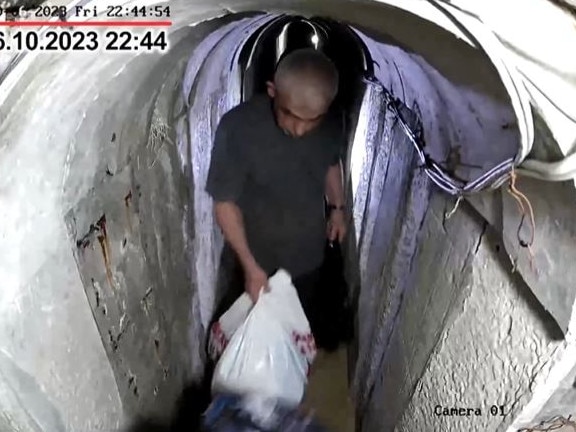 The Israel army has released footage it says shows Hamas leader Yahya Sinwar fleeing underground before the October 7 attack.