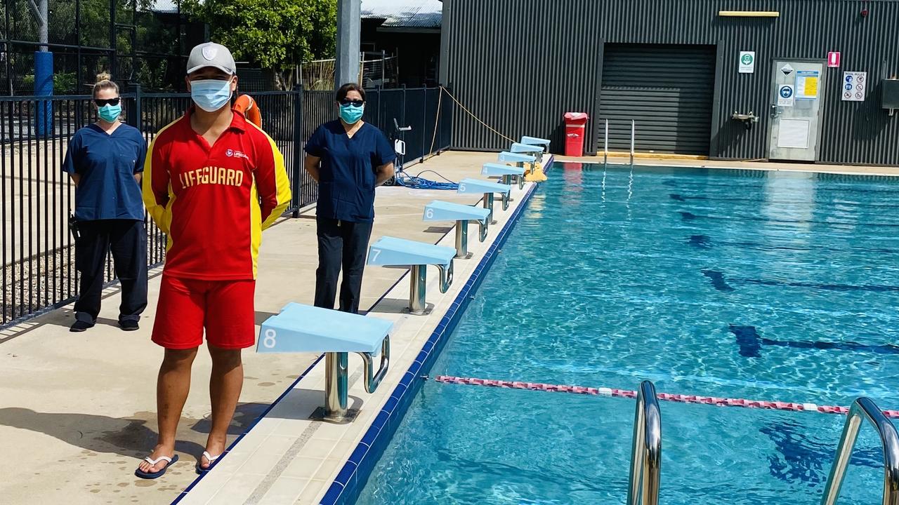 Howard Springs staff and a lifeguard who previously to assisted those in quarantine. Picture GARY SHIPWAY