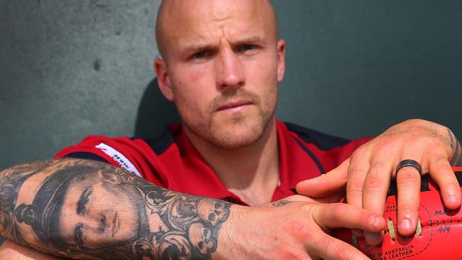 ALICE SPRINGS, AUSTRALIA - MAY 29: Melbourne Demons captain, Nathan Jones shows a tattoo of his forearm of his Grandfather who died of motor-neuron disease on May 29, 2015 in Alice Springs, Australia. (Photo by Michael Dodge/Getty Images for the Herald Sun)