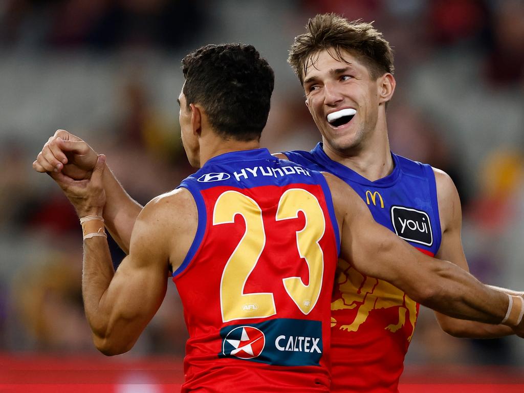 MELBOURNE, AUSTRALIA - APRIL 11: Charlie Cameron (left) and Zac Bailey of the Lions celebrate during the 2024 AFL Round 05 match between the Melbourne Demons and the Brisbane Lions at the Melbourne Cricket Ground on April 11, 2024 in Melbourne, Australia. (Photo by Michael Willson/AFL Photos via Getty Images)