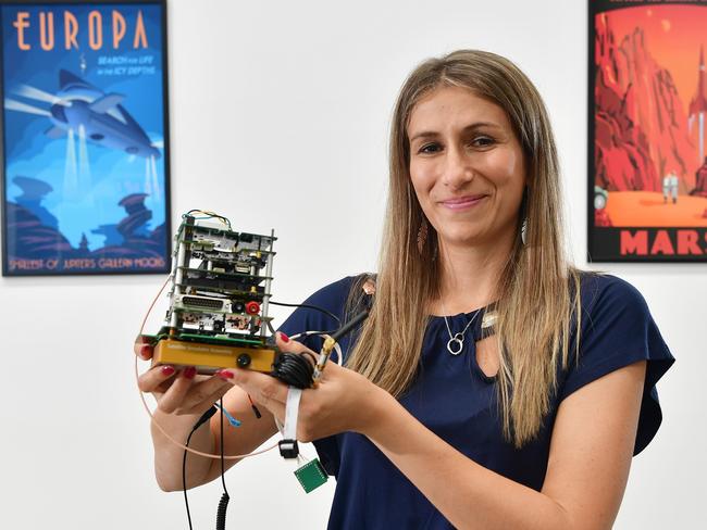 Adelaide-based Fleet Space Technologies chief executive officer Flavia Tata Nardini with a nanosatellite. Picture: Bianca Di Marchi