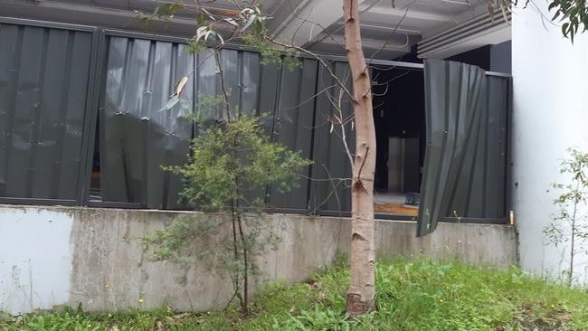 A damaged fence at the rear of the Glenrose Shopping Village at Belrose. Picture: Libby Paulsen