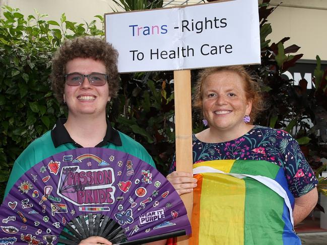 The Cairns trans community and supporting family members protest the State Government's pause on gender therapy including puberty blockers and hormone treatments. Trans boy Matt Seaton, 16 with mum Erin Seaton.  Picture: Arun Singh Mann