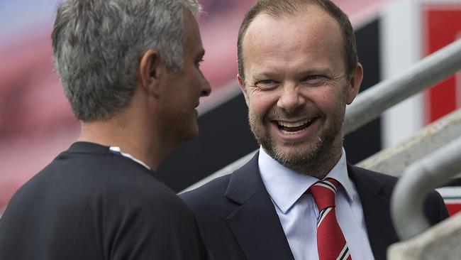Manchester United's executive vice-chairman Ed Woodward (R) with Jose Mourinho.
