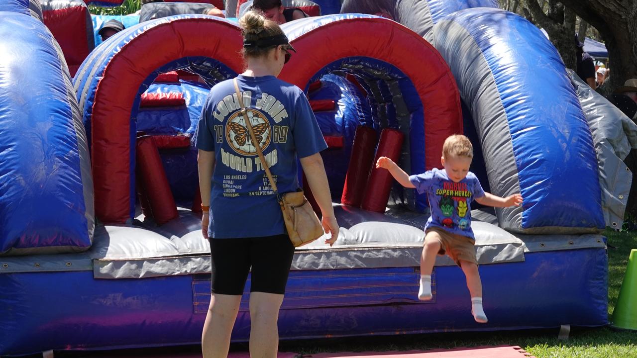 Toddlers got their airtime on at the inflatable at the Bush 2 Beach Festival at Corindi Beach on December 11. Picture: Chris Knight