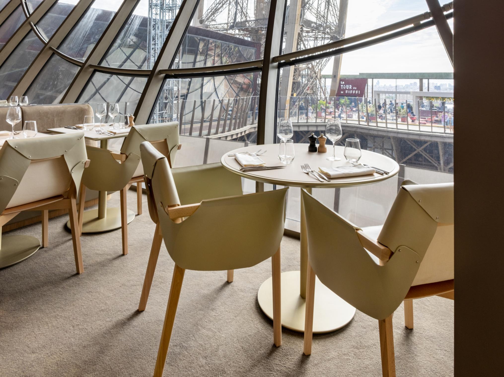 Diners in the Eiffel Tower restaurant, The Paris Hotel, look out