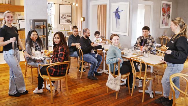 Staff and patrons at Percy Plunkett cafe in Penrith, pictured L to R: Breanna Oakes, Genny Baguinban, Rochelle Anonat, Rachel Odichou, George Odichou holding son Darcy, Isabella Blackwell, Ryan Duffy and Emily Valentine. Picture: Sam Ruttyn