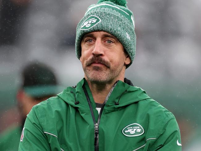 EAST RUTHERFORD, NEW JERSEY - DECEMBER 03: Aaron Rodgers #8 of the New York Jets looks on during warm ups prior to the game against the Atlanta Falcons at MetLife Stadium on December 03, 2023 in East Rutherford, New Jersey. (Photo by Al Bello/Getty Images)