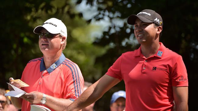 Col Swatton and Jason Day together in 2016. Picture: Drew Hallowell/Getty Images/AFP