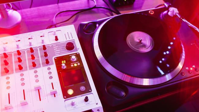 Old school vinyl player and mixer in sound studio. Joey Lightbulb not pictured.