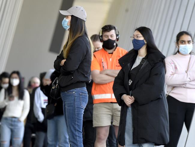 Victorians queue at the vaccination clinic at the Melbourne Exhibition and Convention Centre. Picture: NCA NewsWire / Andrew Henshaw