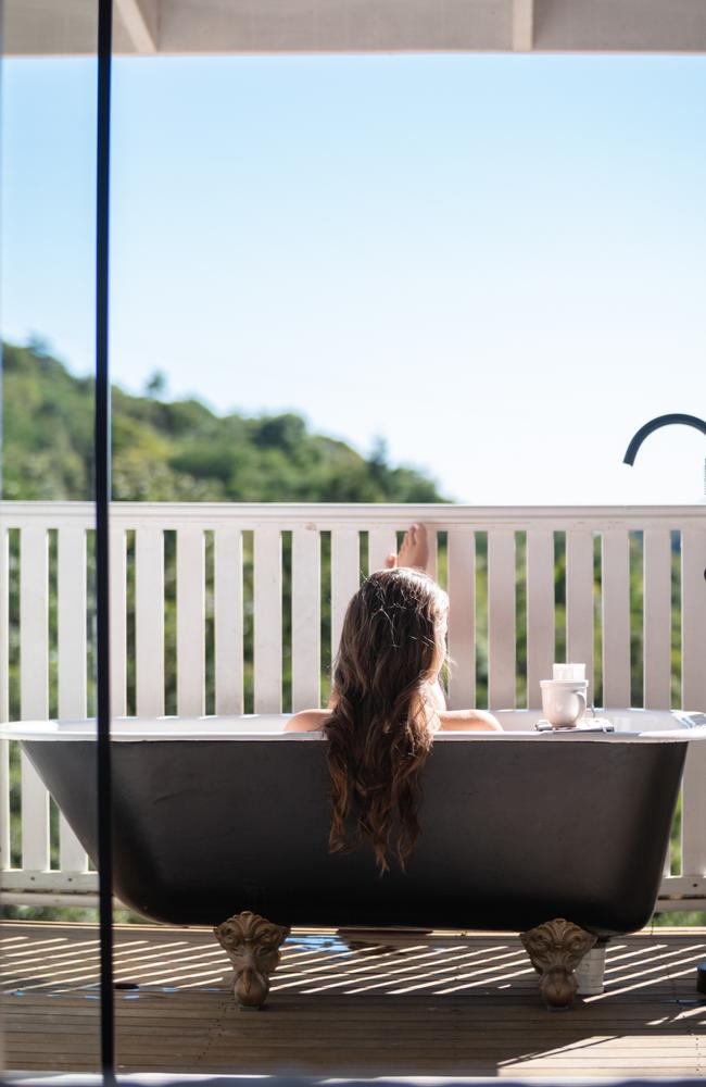 The outdoor bathtub is one of several features of the Doonan property. Picture: Patrick Ault