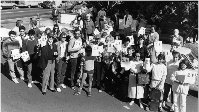 A search party hold up posters of missing schoolgirl Samantha Knight on August 23, 1986.