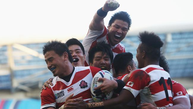 BRIGHTON, ENGLAND — SEPTEMBER 19: Ayumu Goromaru of Japan celebrates scoring a try.