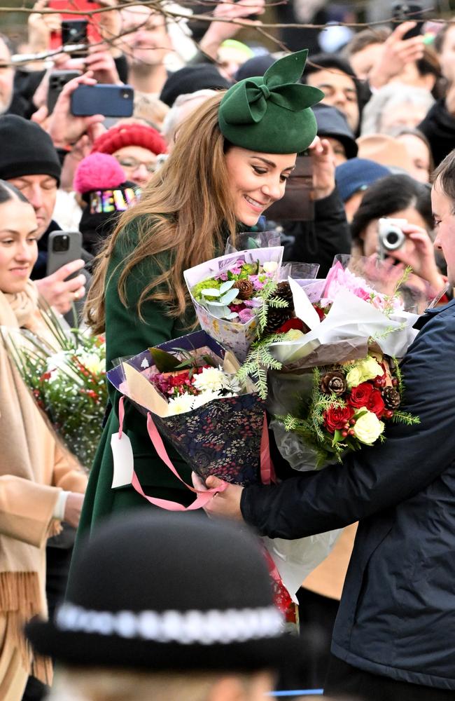 Princess Catherine greets fans who had waited for hours to catch a glimpse of the royals. Picture: Jordan Peck/Getty Images