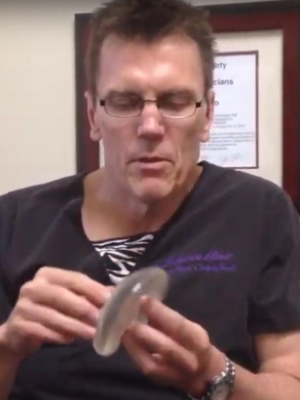 Les Blackstock in a YouTube video, talking about breast implants.