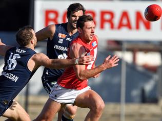 01/07/17 - SANFL match North Adelaide v South Adelaide at Prospect Oval.  North's Cameron Craig under pressure from South's Jordan Taylor.Picture: Tom Huntley