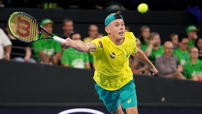 Alex de Minaur stretches for a ball against Alexander Zverev. Picture: AAP