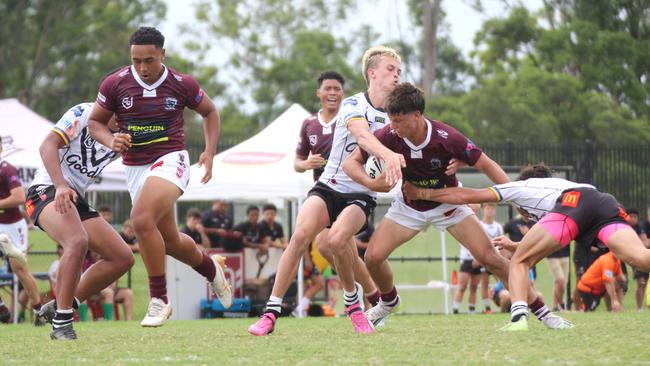 Tom Parker tackling. Connell Cup under-17s action between the Souths Logan Magpies and Burleigh Bears. Saturday February 10, 2024.