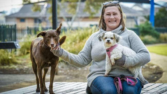 Megan Haynes, with her dogs Suki and Muttley, at Hazelmere Reserve yesterday. Picture: AAP/Roy VanDerVegt