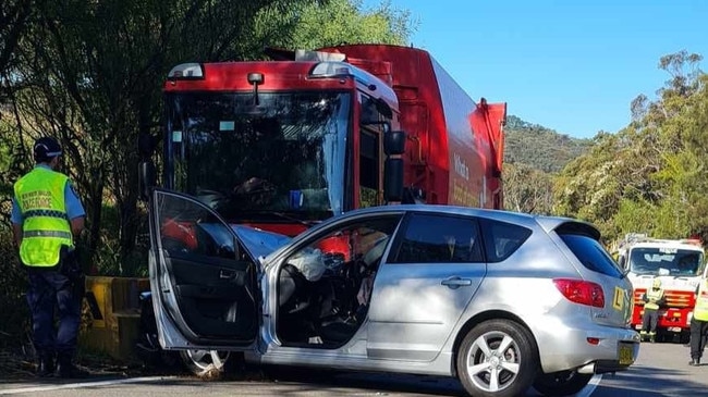 A collision between a garbage truck and a hatchback on Ingleside left an L-plater and his mother in hospital with serious back injuries. Picture: Ingleside Rural Fire Service