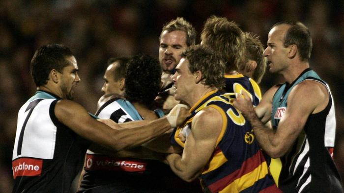 08/09/2005. Mark Ricciuto and Byron Pickett in the middle of a melee. Fight. Adelaide Crows v Port Adelaide. AAMI Stadium. 1st Semi-Final.