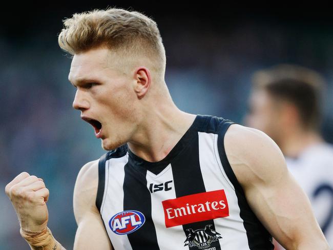 MELBOURNE, AUSTRALIA - JULY 30:  Adam Treloar of the Magpies celebrates a goal during the round 19 AFL match between the Collingwood Magpies and the Adelaide Crows at Melbourne Cricket Ground on July 30, 2017 in Melbourne, Australia.  (Photo by Michael Dodge/Getty Images)