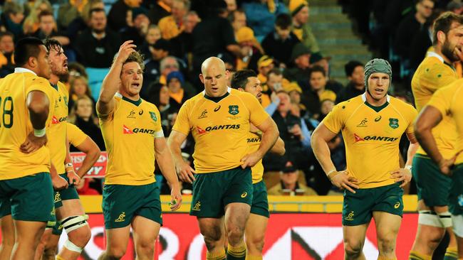 The Wallabies lick their wounds after being thrashed by the All Blacks in Sydney.