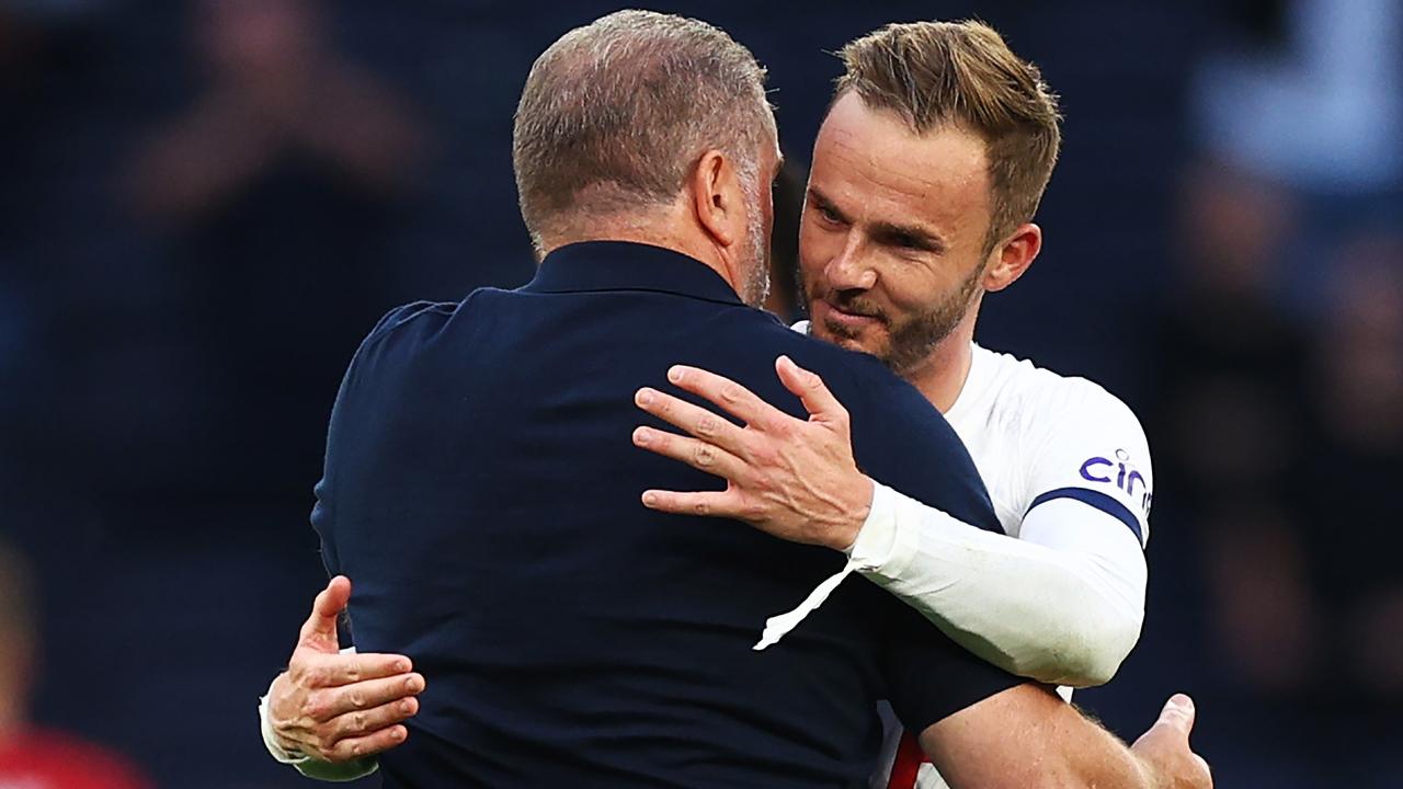 James Maddison of Tottenham Hotspur embraces the team's manager, Ange Postecoglou. Photo by Clive Rose/Getty Images.