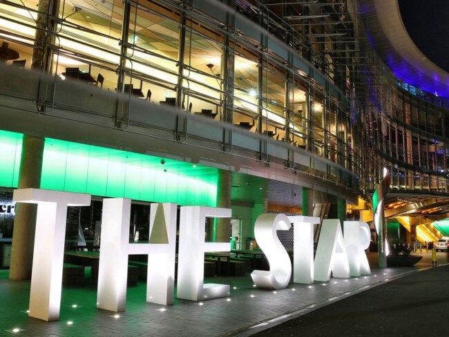 The Star casino, operated by Echo Entertainment Group Ltd., stands illuminated at night in Sydney, Australia, on Monday, Aug. 10, 2015. Echo Entertainment is scheduled to report full-year results on Aug. 12. Photographer: Brendon Thorne/Bloomberg