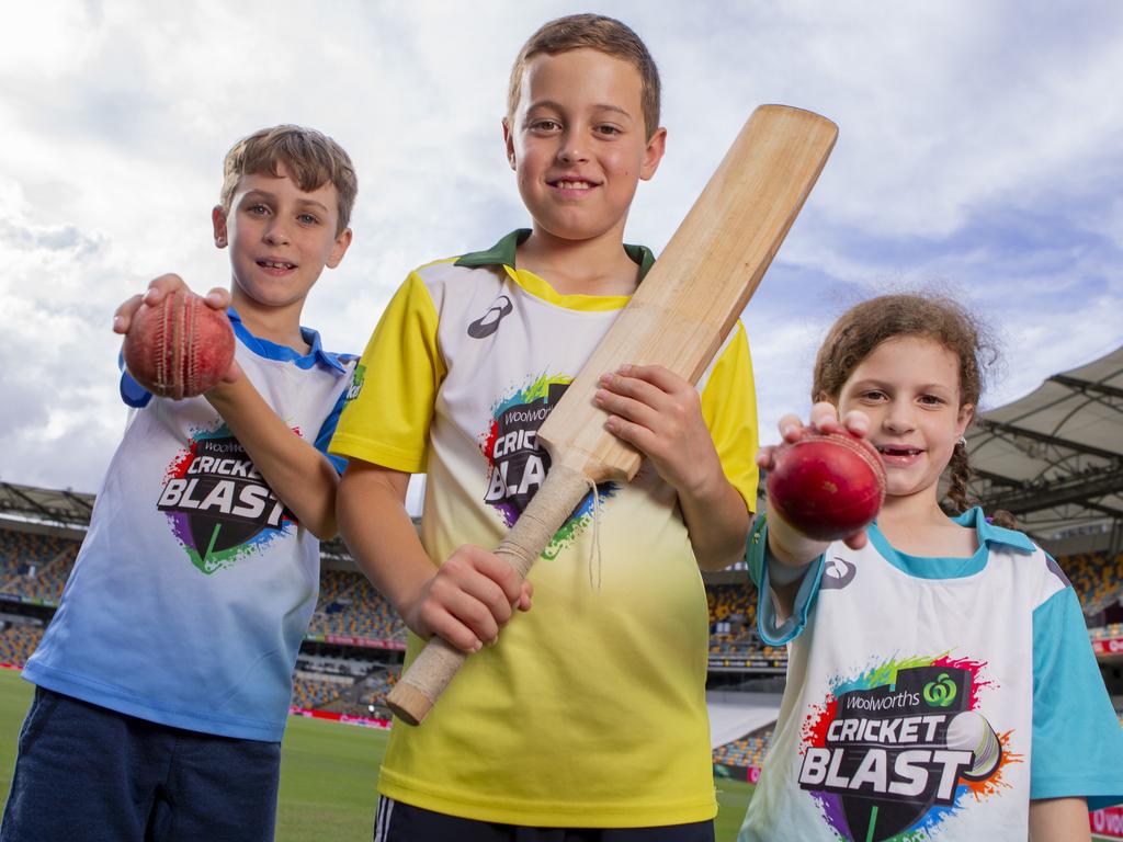 Cricket Blast kids is  back on the field this year during the lunch break. Kids weren't allowed last year due to covid.  Matthew Richardson, 9, Alex wood, 9, and  Grace Richardson, 7, , at The Gabba.  Picture: Jerad Williams