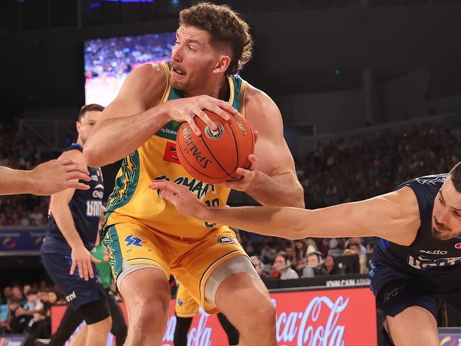 Will Magnay of the JackJumpers handles the ball against Chris Goulding of United during game three of the NBL Championship Grand Final Series between Melbourne United and Tasmania JackJumpers. (Photo by Kelly Defina/Getty Images)