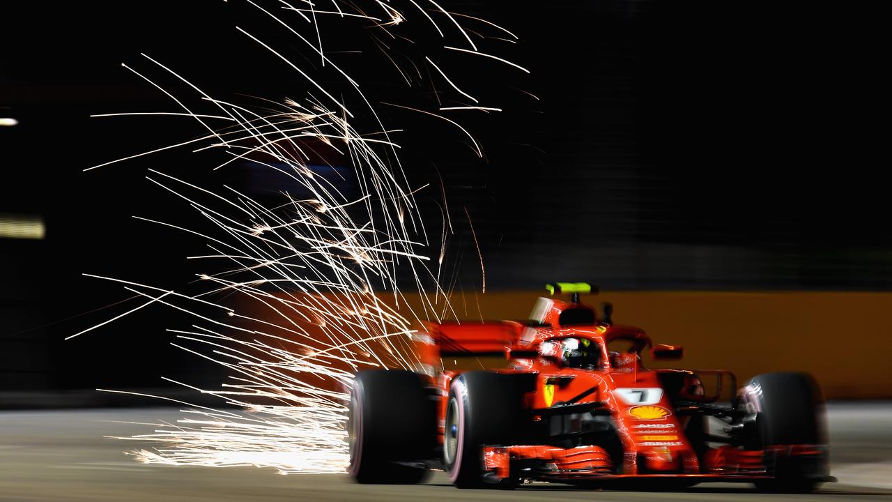 Sparks fly behind Kimi Raikkonen during practice for the Singapore GP.
