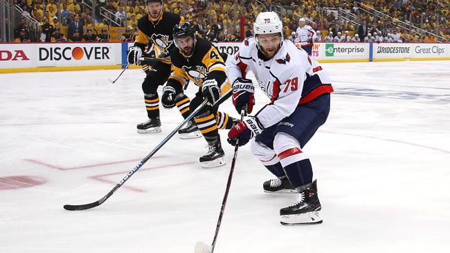 Australia’s Nathan Walker of the Washington Capitals takes on the Pittsburgh Penguins at PPG Paints Arena in Pittsburgh yesterday