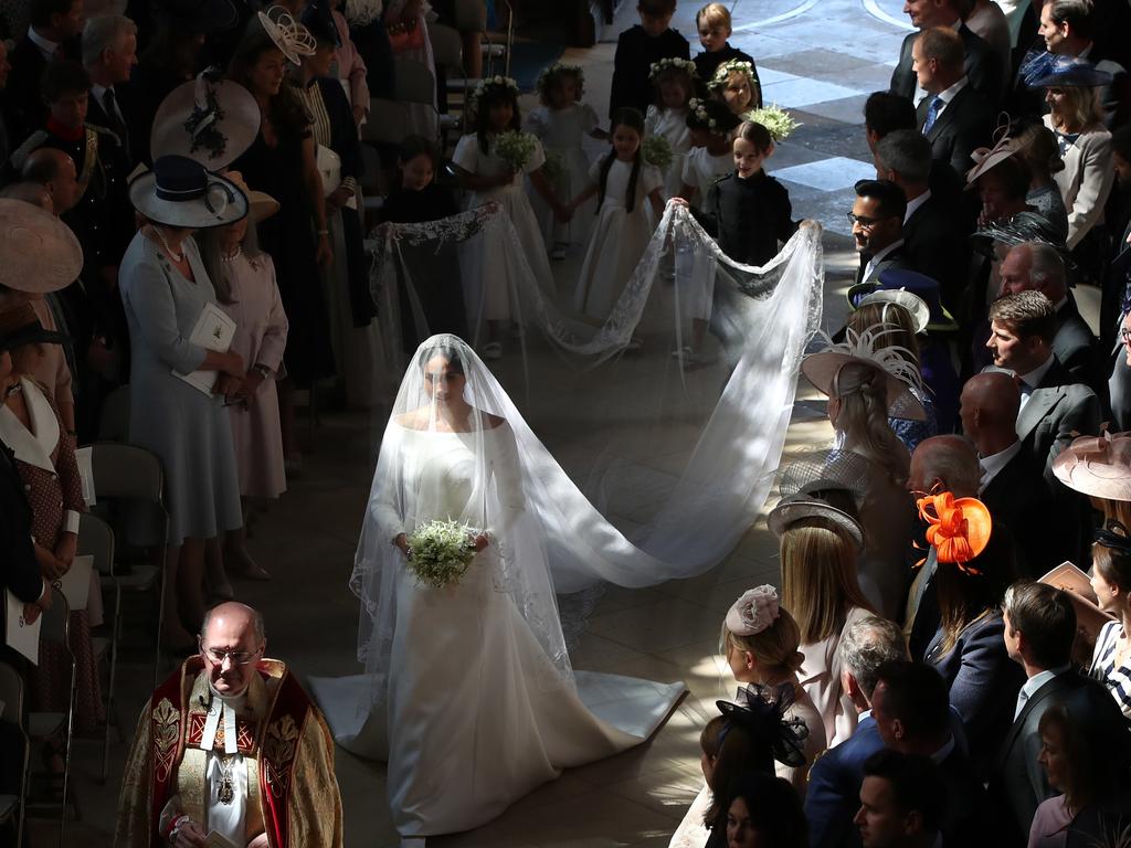 Meghan walked down the aisle solo to begin with. Picture: Brian Lawless/Getty Images