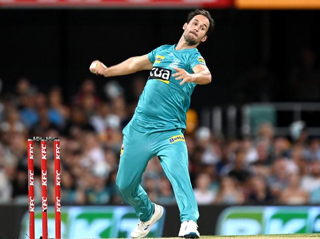 BRISBANE, AUSTRALIA - DECEMBER 27: Lewis Gregory of the Heat bowls during the Big Bash League match between the Brisbane Heat and the Hobart Hurricanes at The Gabba, on December 27, 2020, in Brisbane, Australia. (Photo by Bradley Kanaris/Getty Images)