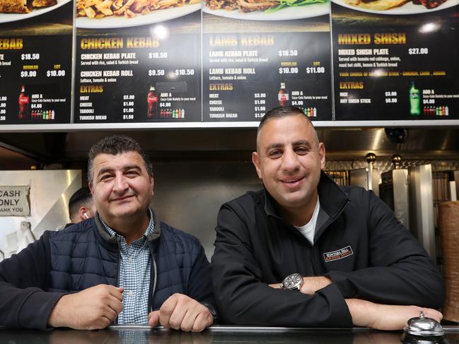 Rob Shehadie, right, with Atilla Tok, owner of New Star Kebabs in Auburn and the western Sydney kebab shop king. Open since 2000, Atilla’s store goes through one ton of meat a week and is the busiest kebab shop in NSW. Picture: Jonathan Ng