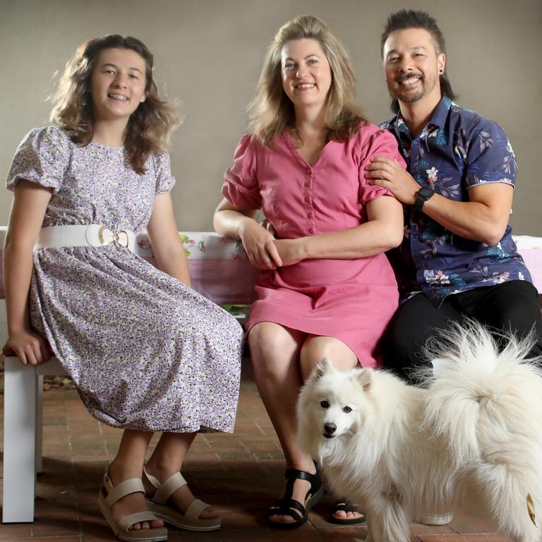 Cherie Lee – pictured with daughter Aria, 13, husband Simon and dog Spirit – felt her life was falling apart before she started menopause hormone therapy. Picture: Dean Martin