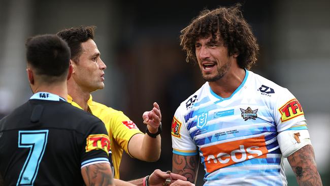 Titans' Kevin Proctor and Cronulla's Shaun Johnson come together after Johnson was allegedly bitten by Proctor in a tackle. Picture. Phil Hillyard