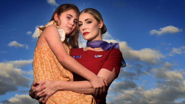 Flight attendant Becky Branca, with daughter Izabella Branca, is devastated at the announcement having worked at Virgin Australia for 17 years. Picture: Tony Gough