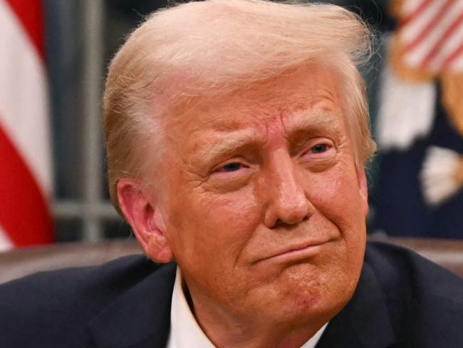 US President Donald Trump signs executive orders in the Oval Office of the White House in Washington, DC, on January 20, 2025. Picture: NewsWire / Jim WATSON / POOL / AFP