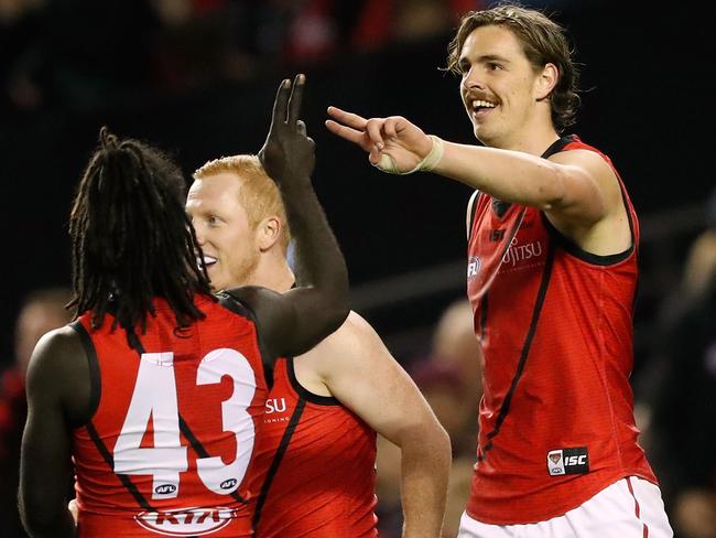 MELBOURNE, AUSTRALIA - JULY 14: Joe Daniher of the Bombers (right) celebrates a goal with Anthony McDonald-Tipungwuti of the Bombers during the 2017 AFL round 17 match between the St Kilda Saints and the Essendon Bombers at Etihad Stadium on July 14, 2017 in Melbourne, Australia. (Photo by Adam Trafford/AFL Media/Getty Images)