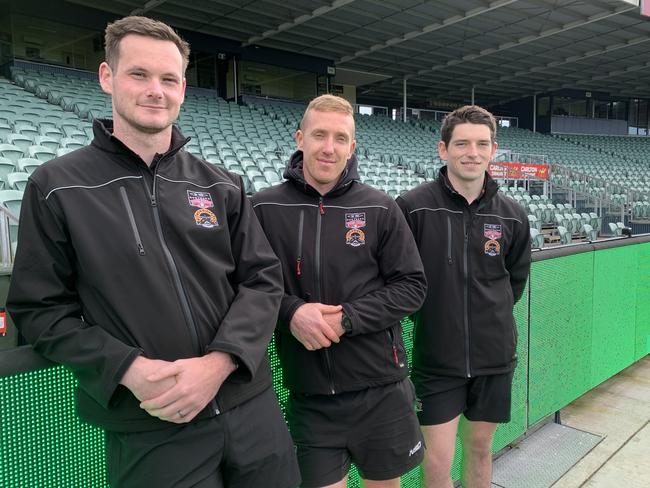 Brad Cox-Goodyer (middle) and Ben Simpson (right) with Bombers co-captain Alex Lee before last year’s TSL grand final. Picture: Jon Tuxworth