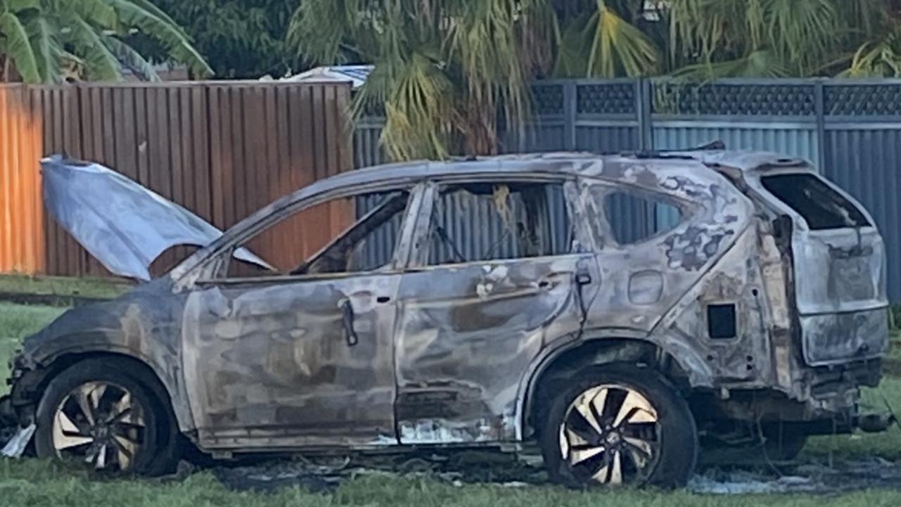 A burnt out car found dumped after a man was kidnapped at Westmead overnight. Picture: Supplied