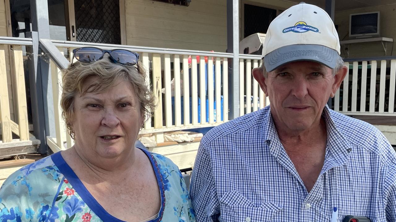 Lesley and Melvin Simpkins stand outside the house on their property on Rossmore Rd. They fear Powerlink's transmission lines will come within a few hundred metres of their home. Picture: Christine Schindler