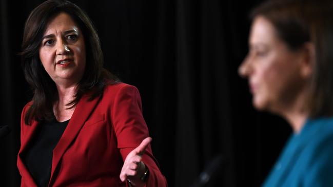 BRISBANE, AUSTRALIA - NewsWire Photos - OCTOBER 28, 2020. Queensland Premier Annastacia Palaszczuk (left) and opposition Leader Deb Frecklington engage in a debate during the Sky News - Courier Mail People's Forum at the Broncos Leagues club in Brisbane, ahead of the October 31 state election. Picture: NCA NewsWire / Dan Peled