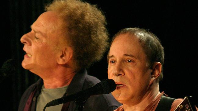 Art Garfunkel, left, and Paul Simon perform in New York.