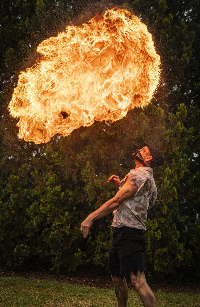 Neal Webb of Energy Entertainment performs as a zombie fire entertainer at Toowoomba’s Witches Market. Picture: Kevin Farmer